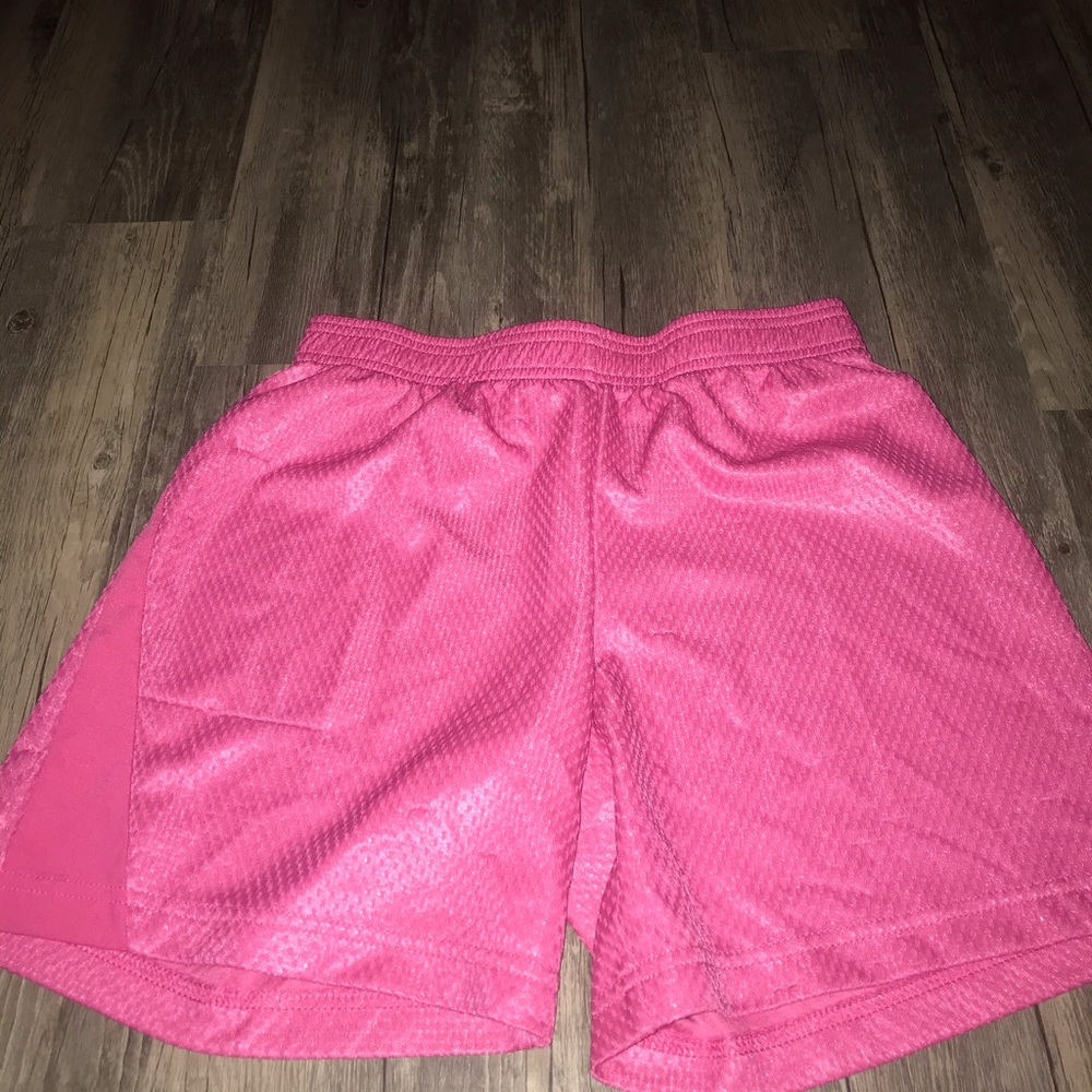 mid thigh basketball shorts a couple loose threads
